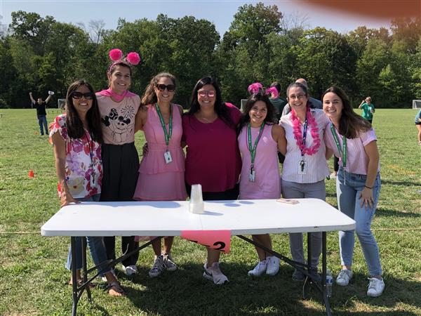 Teachers dressed in pink.