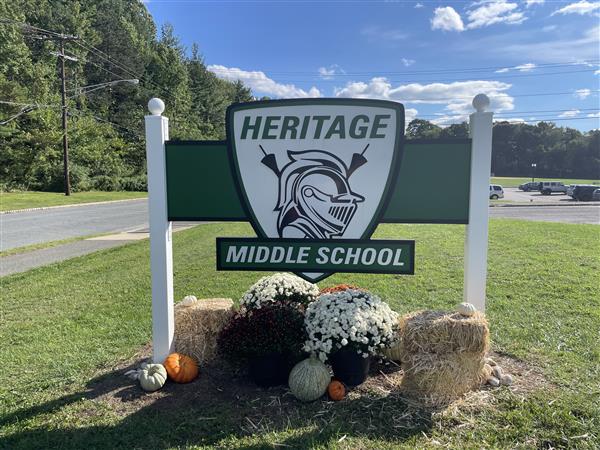 HMS sign with fall mums